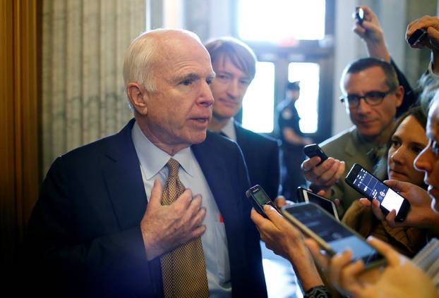 Senator John McCain speaks to reporters at the U.S. Capitol in Washington