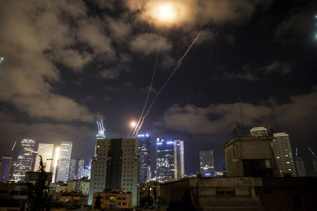 Missiles launched from Iran are intercepted as seen from Tel Aviv