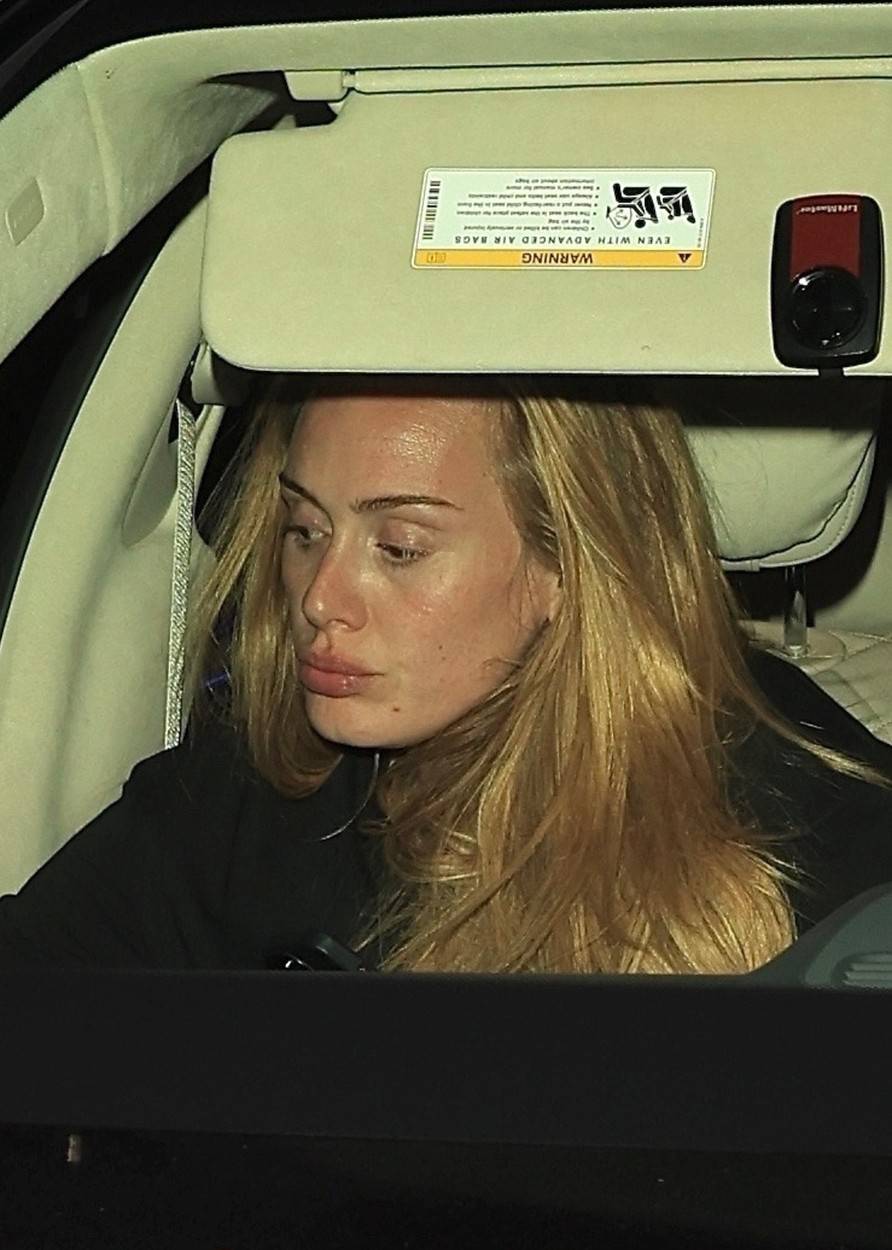 *EXCLUSIVE*  A VERY PLUMPED LIP ADELE sneaks her skinny frame out of Avra after dinner date with boyfriend Rich Paul - ** WEB MUST CALL FOR PRICING **