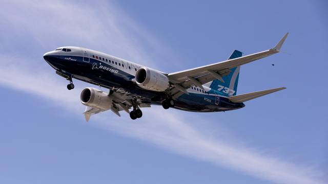 FILE PHOTO: FILE PHOTO: A Boeing 737 MAX airplane lands after a test flight at Boeing Field in Seattle