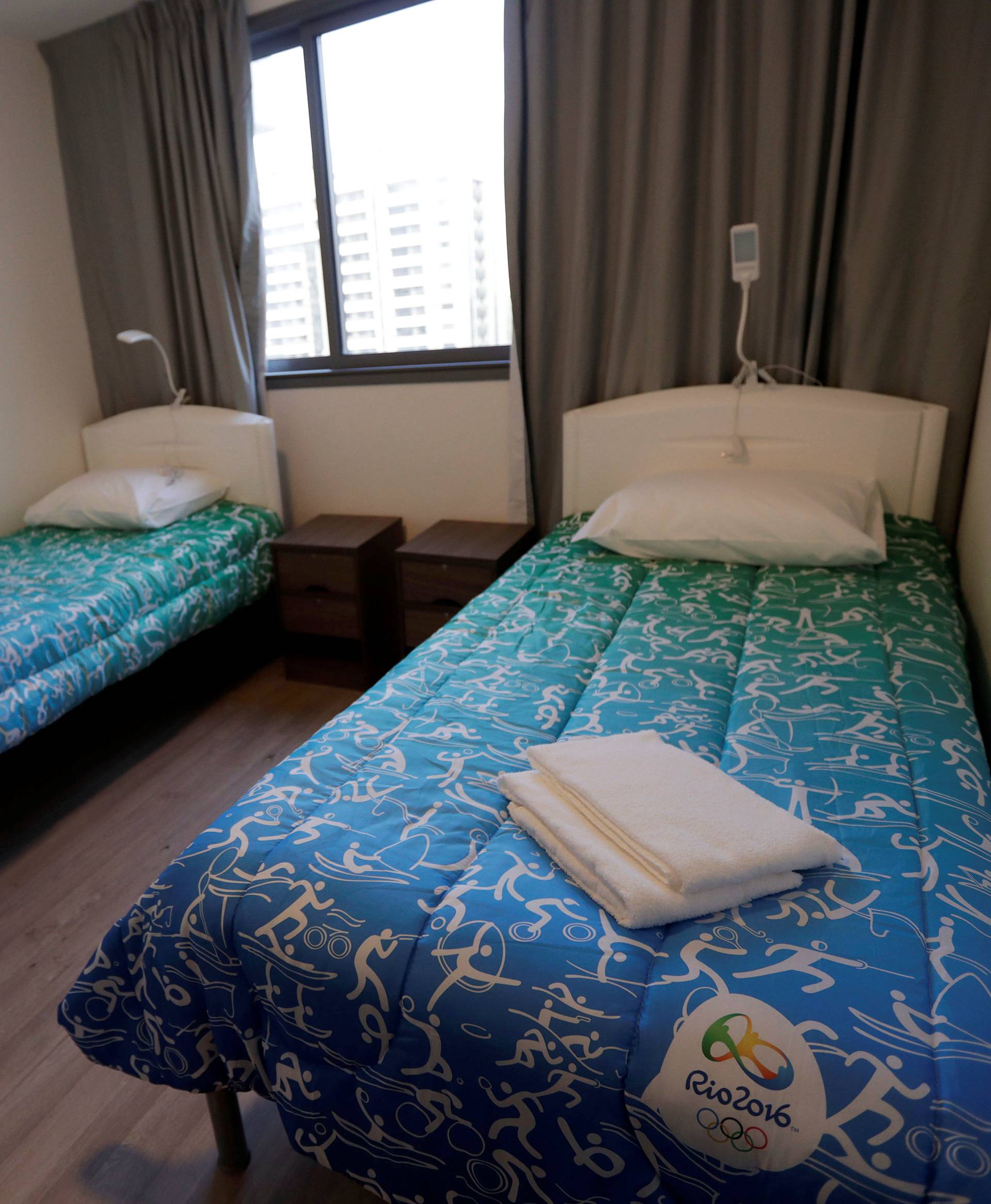 Beds are seen inside the athletes' accommodation during a guided tour for journalists to the 2016 Rio Olympics Village in Rio de Janeiro