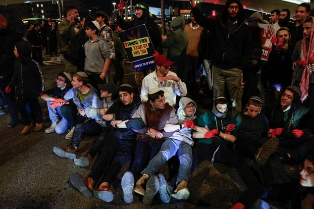 Israelis protest a ceasefire deal, in Jerusalem