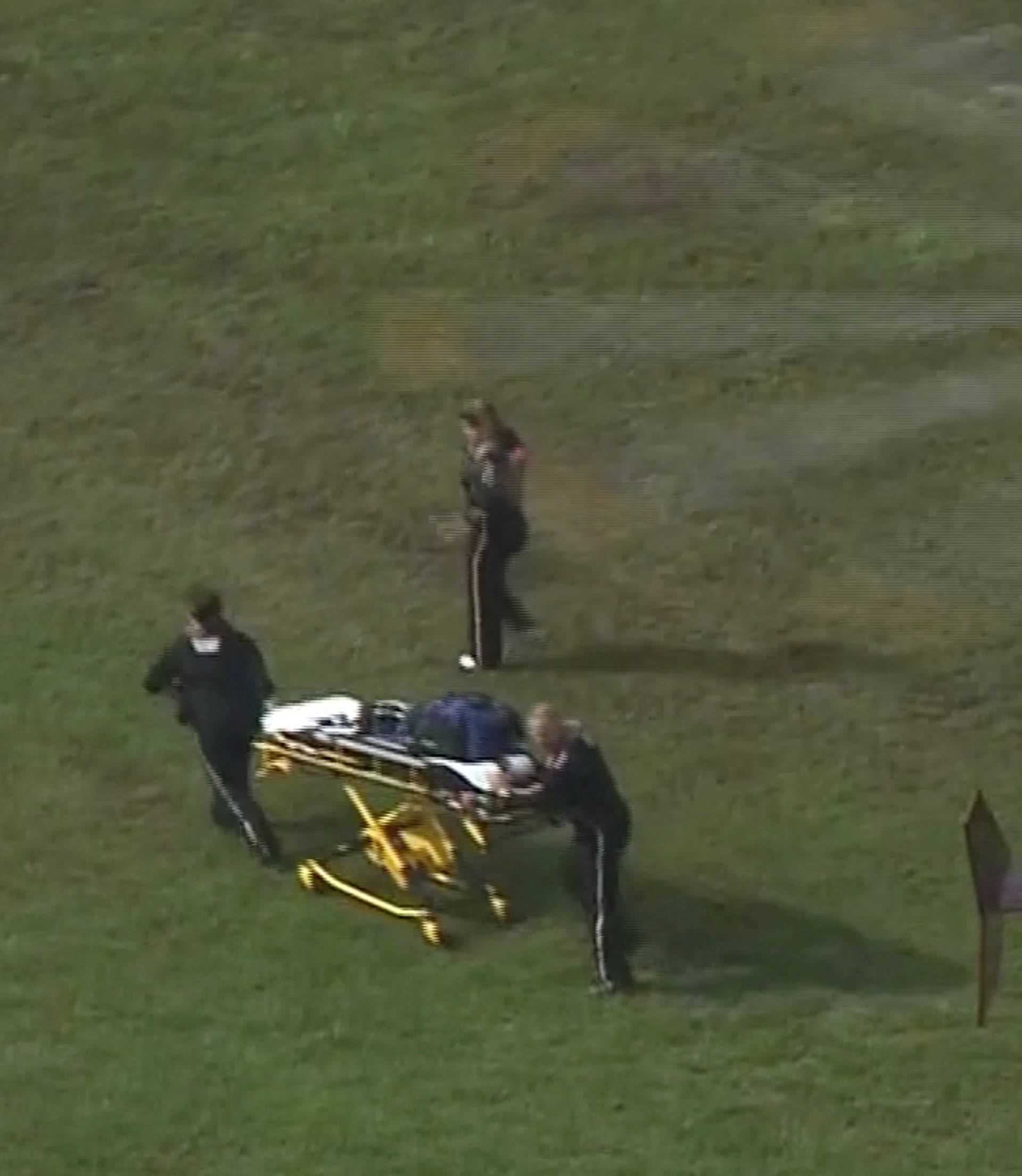 Rescue workers unload a stretcher from a helicopter following a shooting incident at the municipal center in this still image from video in Virginia Beach