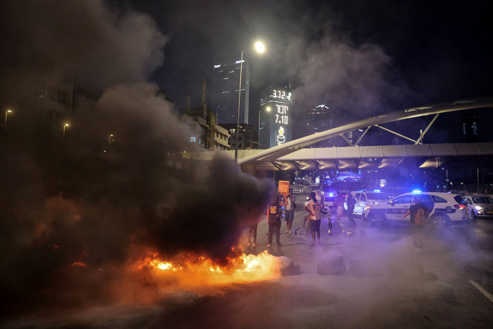 Families and supporters of hostages protest demanding the immediate release of hostages who were kidnapped during the deadly October 7 attack, amid the ongoing conflict in Gaza between Israel and Hamas, in Tel Aviv