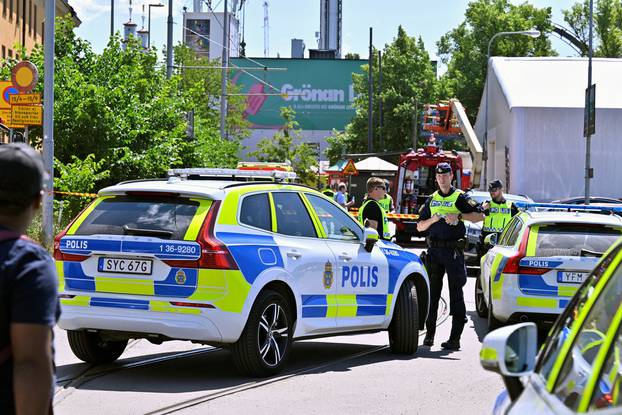 Police at the scene after roller coaster accident at amusement park in Stockholm