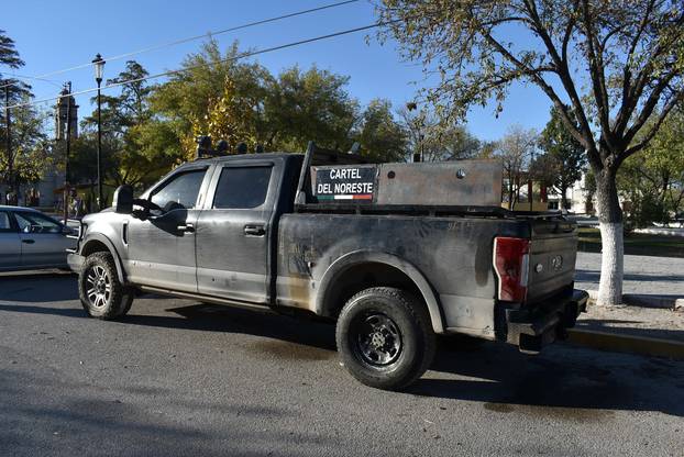 A pick up truck is pictured after clashes sparked by suspected cartel gunmen in a northern Mexican town killed 20 people this weekend in Villa Union
