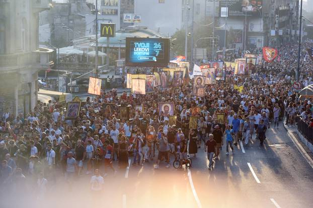 People march during a protest against the international LGBT event Euro Pride in Belgrade