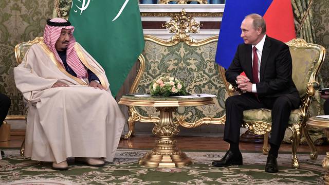 Russian President Vladimir Putin meets with Saudi Arabia's King Salman in the Kremlin in Moscow