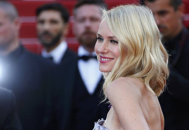 Actress Naomi Watts poses on the red carpet as she arrives for the opening ceremony and the screening of the film "Cafe Society" out of competition during the 69th Cannes Film Festival in Cannes