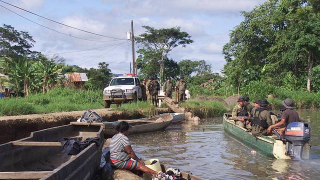 FILE PHOTO: Panamanian police patrol the Tuira river in the Darien Gap