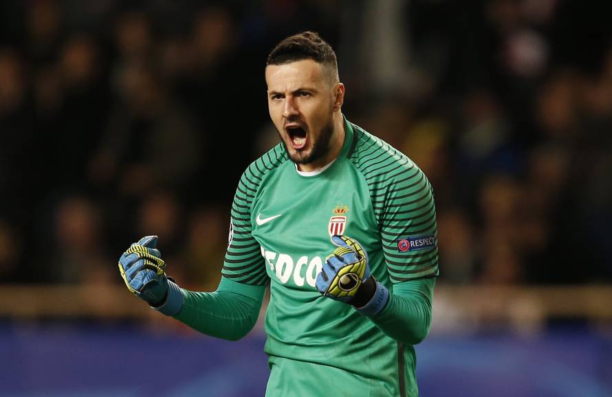 Monaco's Danijel Subasic celebrates after Monaco's Djibril Sidibe (not pictured) scores their first goal