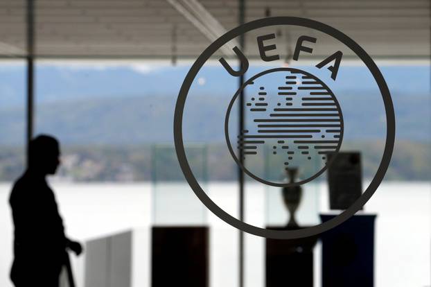 FILE PHOTO: A logo is pictured on UEFA headquarters in Nyon