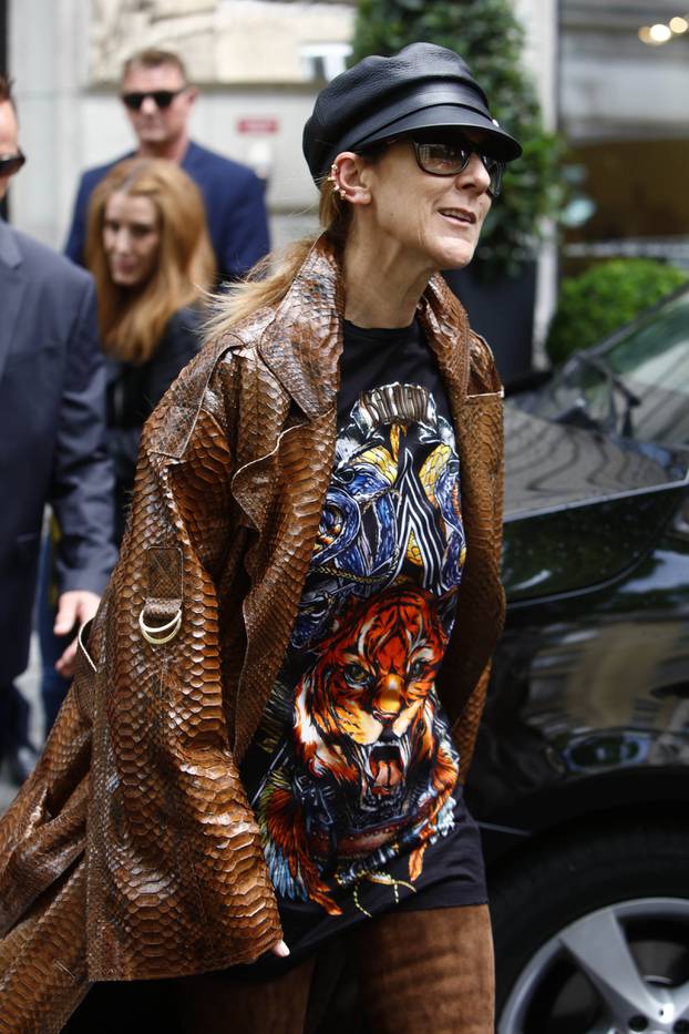 Canadian singer Celine Dion leaves her hotel in Paris