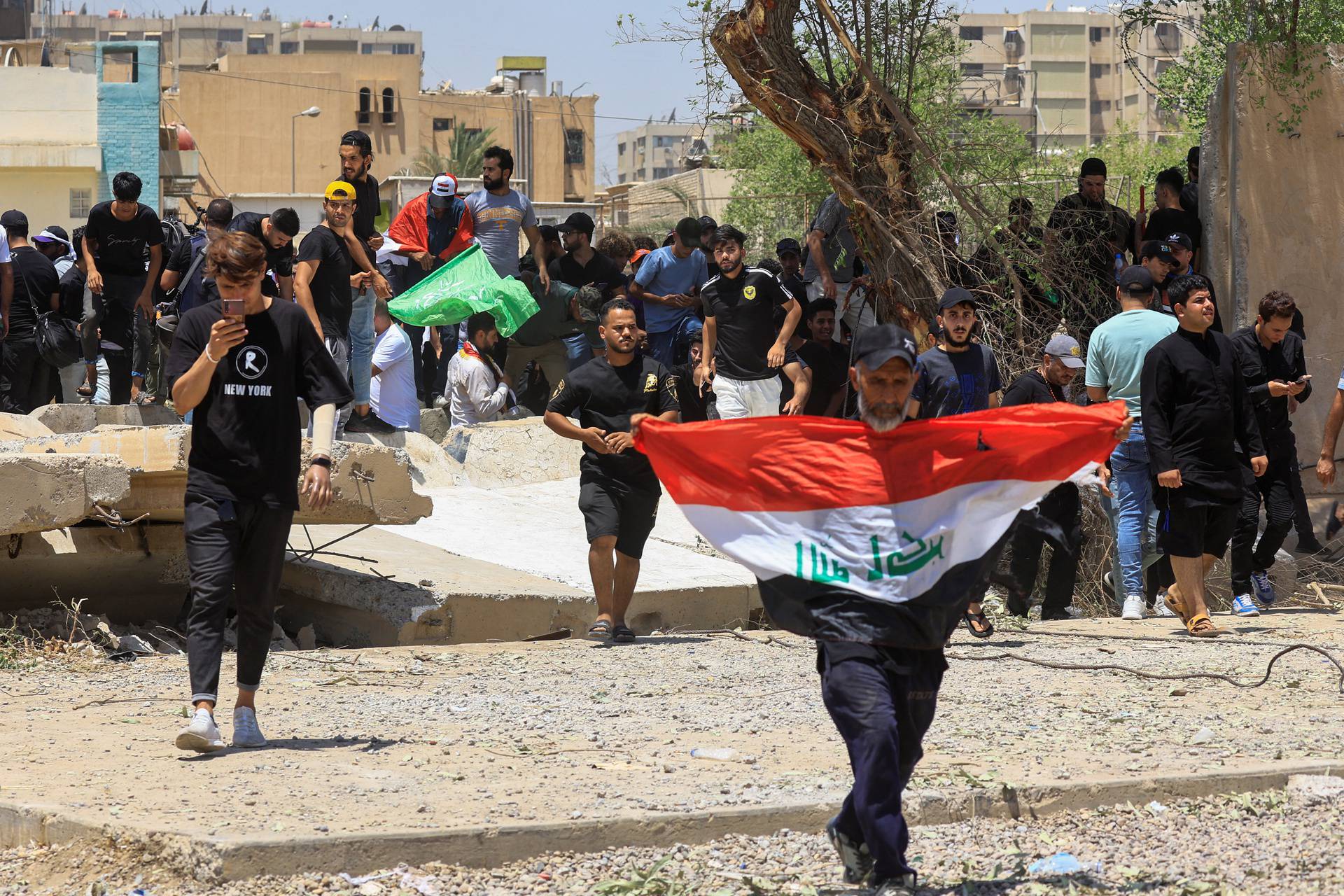 Supporters of Iraqi Shi'ite cleric Moqtada al-Sadr protest against corruption, in Baghdad