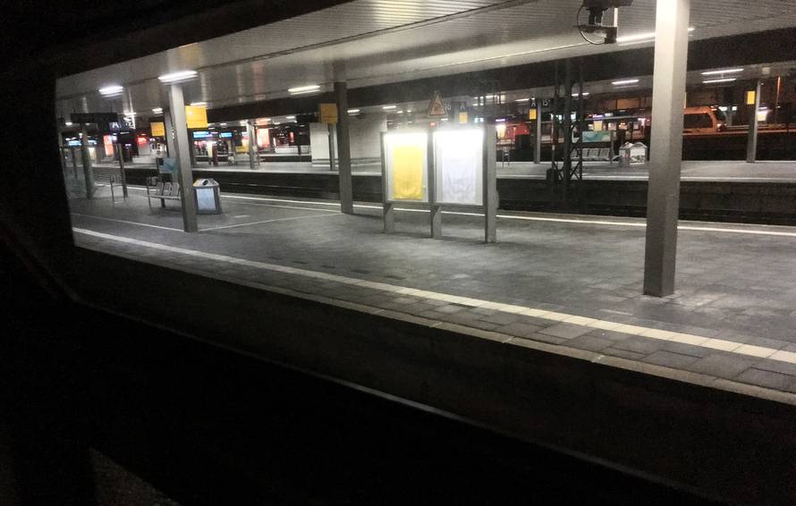 A picture taken out of a train shows empty platforms at Dusseldorf train station