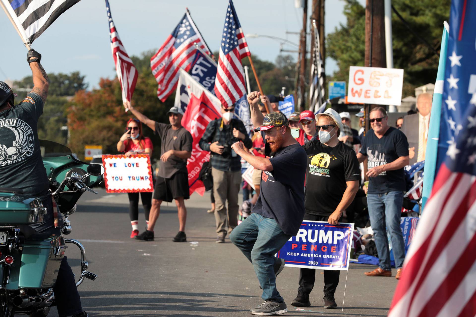 Supporters rally for U.S. President Donald Trump outside of the Walter Reed National Military Medical Center