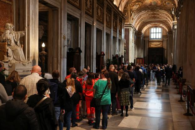 People queue to visit the tomb of the late Pope Francis in the Papal Basilica of Saint Mary Major (Santa Maria Maggiore), in Rome