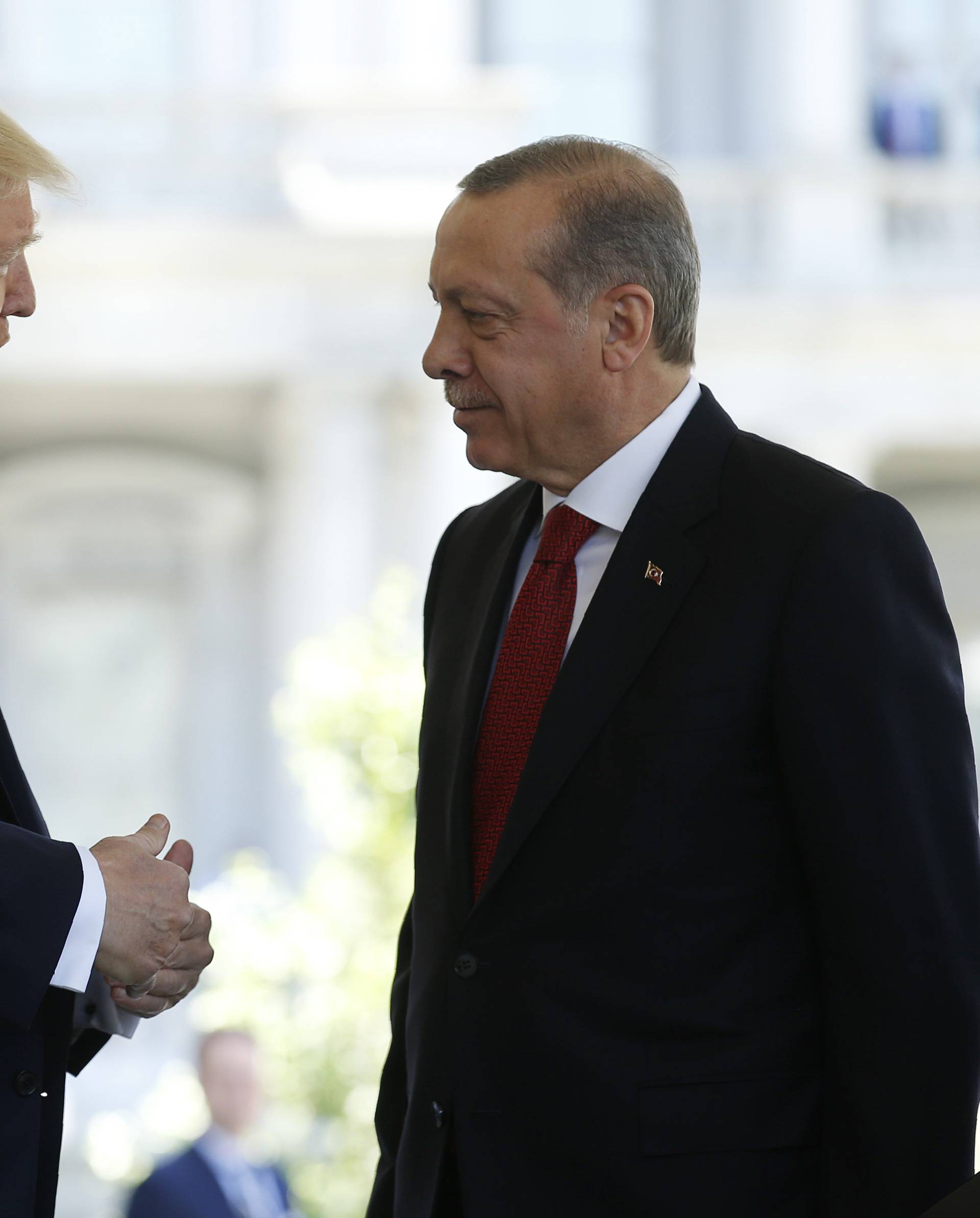 President Trump talks with Turkey's President Erdogan at the entrance to the West Wing of the White House in Washington