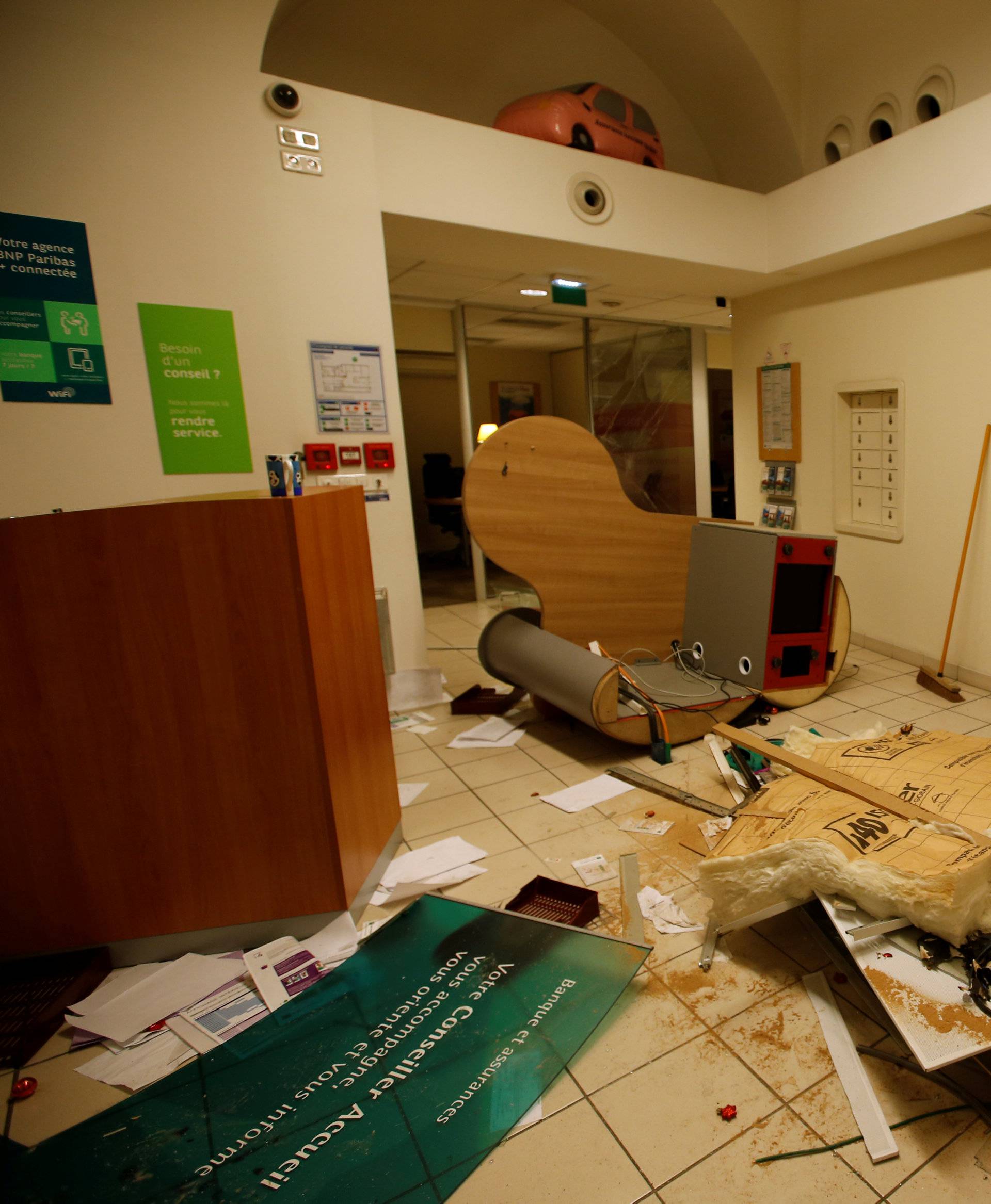 The interior of a vandalized bank branch is seen the day after clashes during a national day of protest by the "yellow vests" movement in Bordeaux