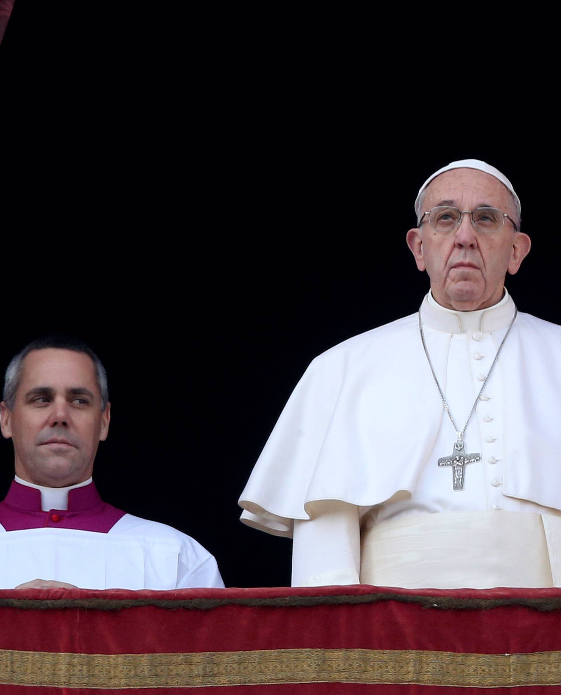 Pope Francis arrives to leads "Urbi et Orbi" (to the city and the world) message from the balcony overlooking St. Peter's Square at the Vatican