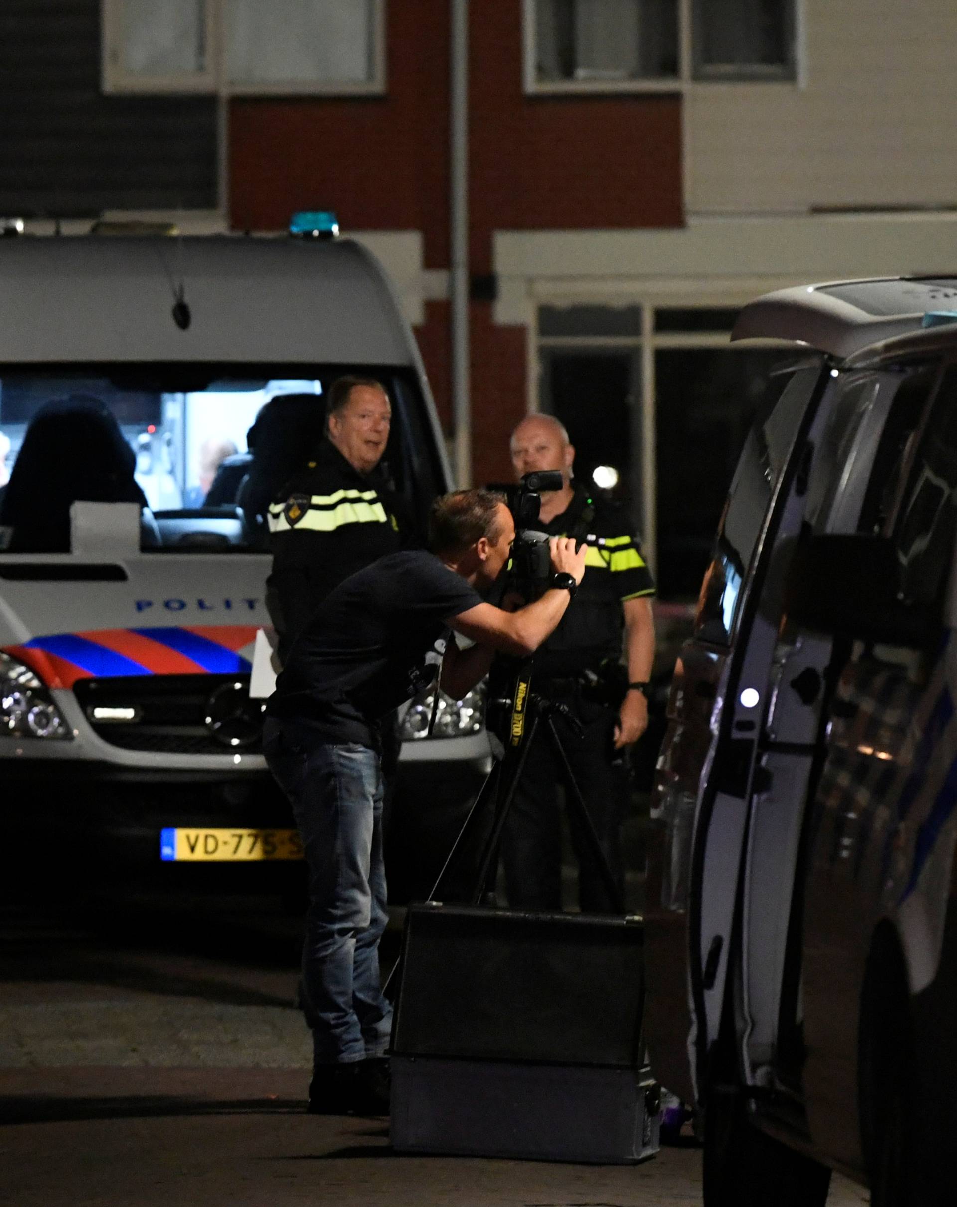 Police secure the area after a shooting in the Dutch city of Dordrecht