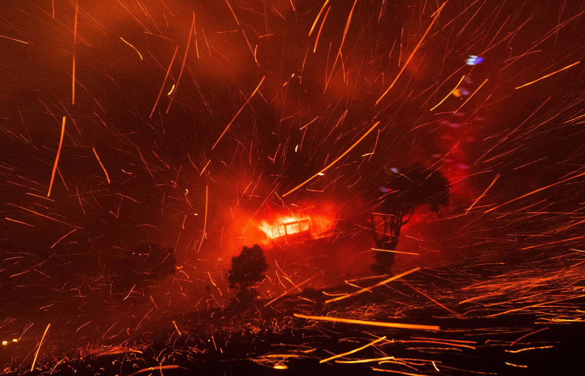 Palisades Fire burns during a windstorm on the west side of Los Angeles