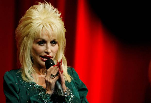 FILE PHOTO: US singer Parton speaks at the launch of her Imagination Library in the Magna Centre in Sheffield