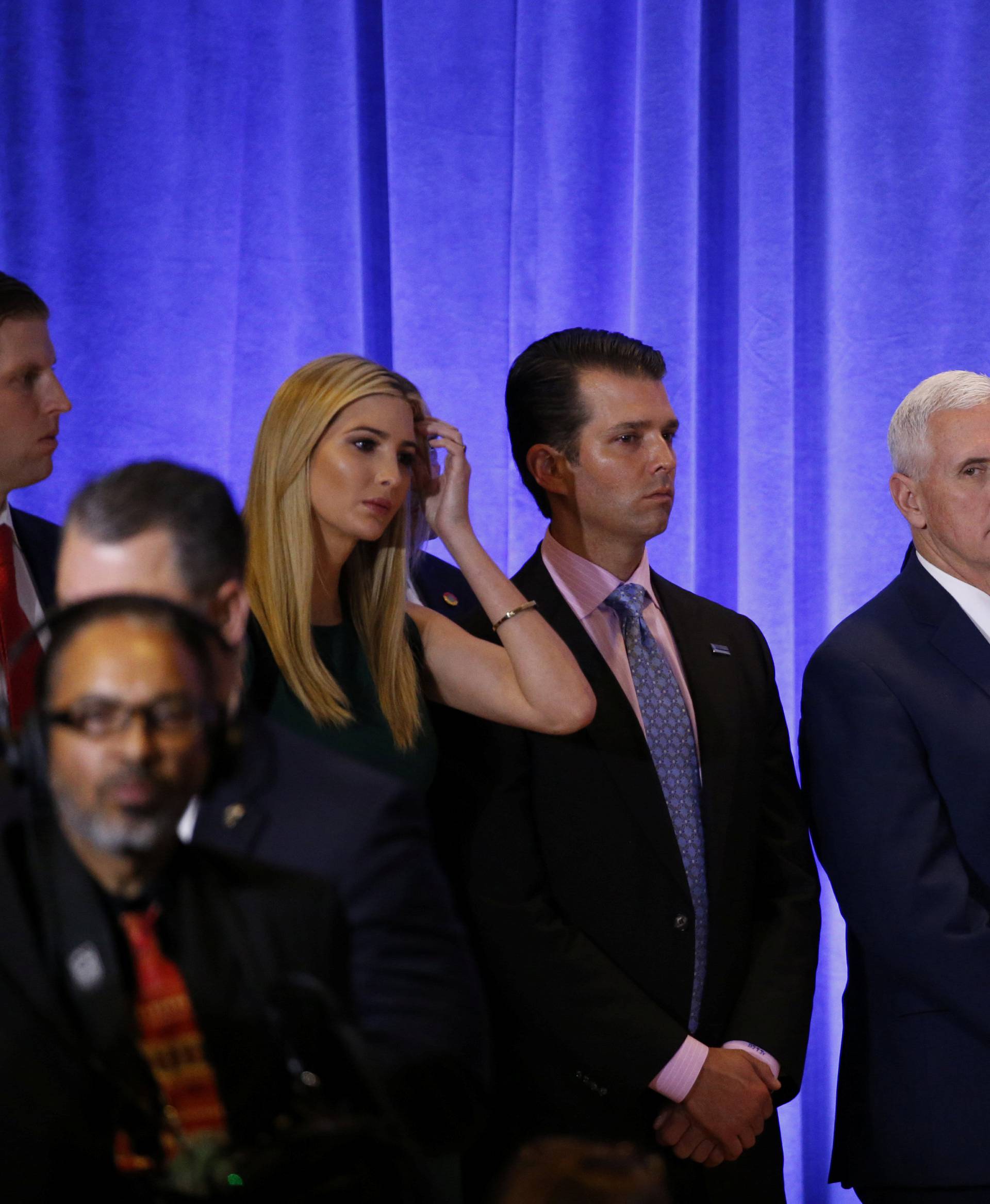 U.S. President-elect Donald Trump stands with Vice President-elect Mike Pence, his sons Donald Trump Jr. and Eric Trump, and daughter Ivanka, during a news conference in the lobby of Trump Tower in Manhattan, New York City