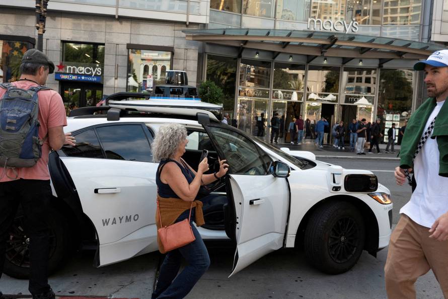 FILE PHOTO: Waymo driverless taxi