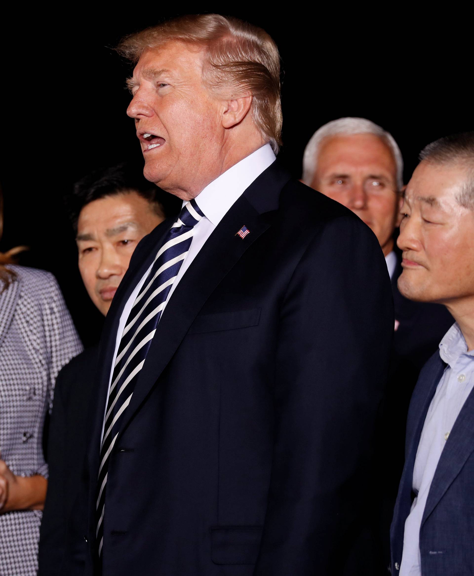 U.S.President Donald Trump speaks to the media as he meets the Americans released from detention in North Korea upon their arrival at Joint Base Andrews