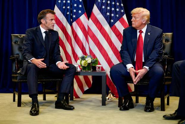 FILE PHOTO: U.S. President Trump and French President Macron meet during the 80th United Nations General Assembly, in New York City