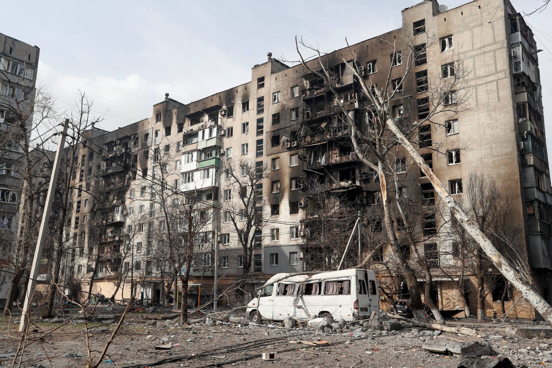 A view shows a destroyed apartment building in the besieged city of Mariupol