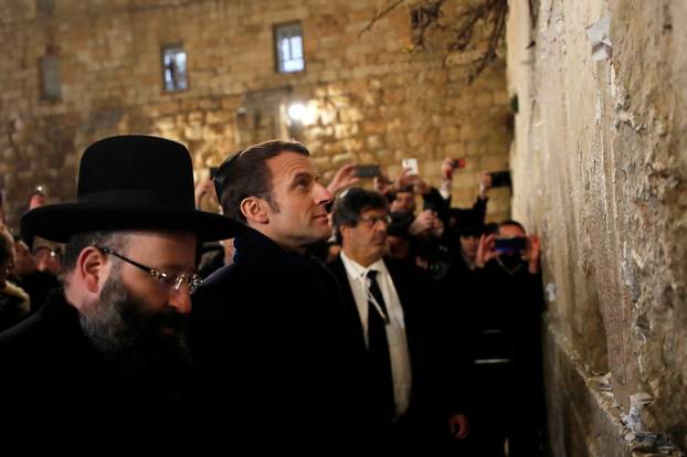 French President Macron stands by the Western Wall in Jerusalem