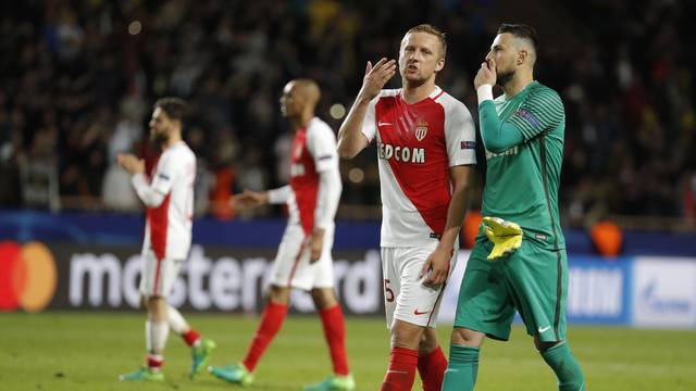 Monaco's Jemerson and Danijel Subasic look dejected after the match