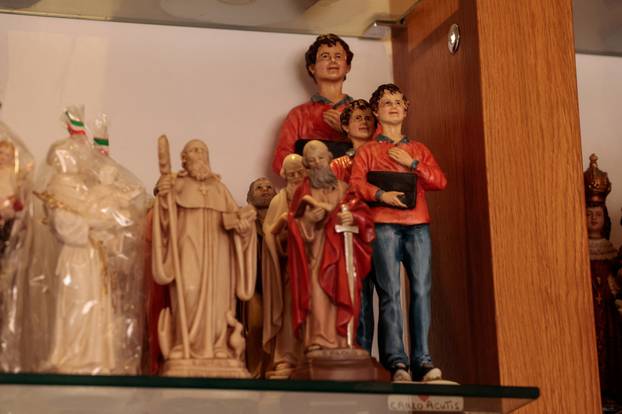 Souvenirs of Carlo Acutis are displayed, in Rome