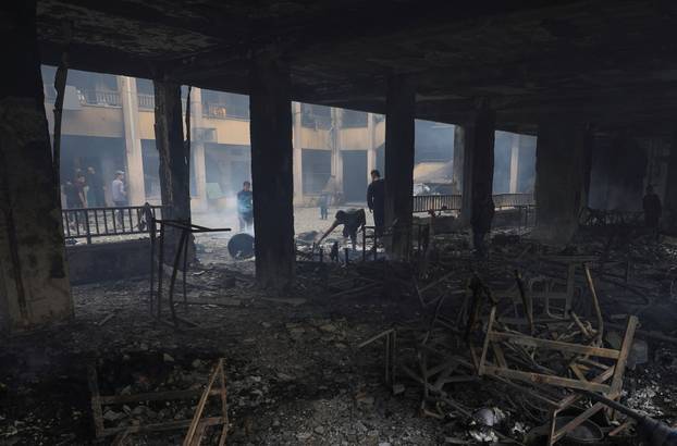 Israeli strike at a school sheltering displaced Palestinians, in Gaza City