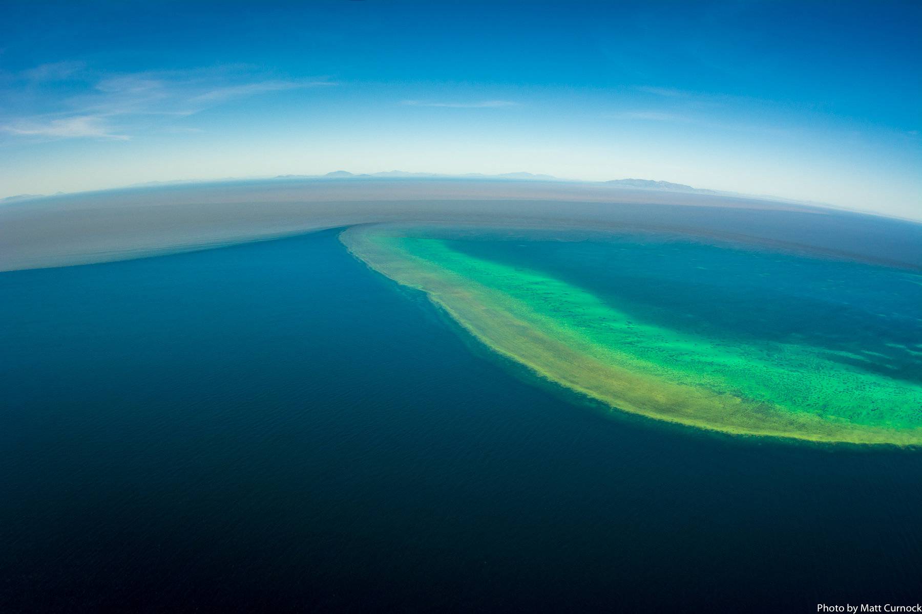 Sediment-filled water is seen in the Great Barrier Reef