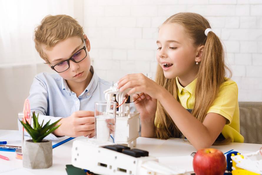 Two,Students,,A,Boy,And,A,Girl,,Work,Together,On