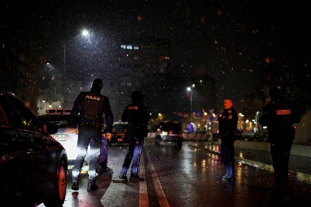 Kosovo Police patrols the bridge of the ethnically-divided town of Mitrovica