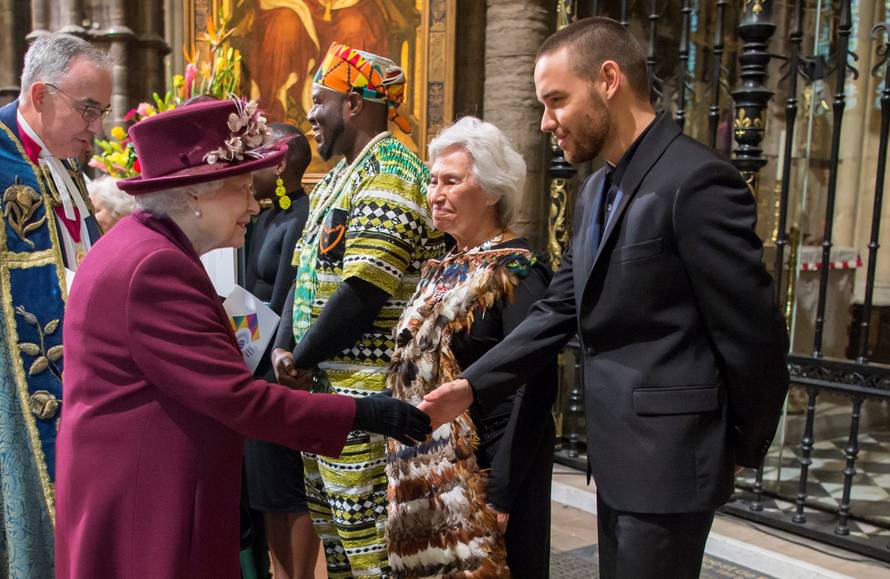 Britain's Queen Elizabeth meets Liam Payne after the Commonwealth Service at Westminster Abbey in London