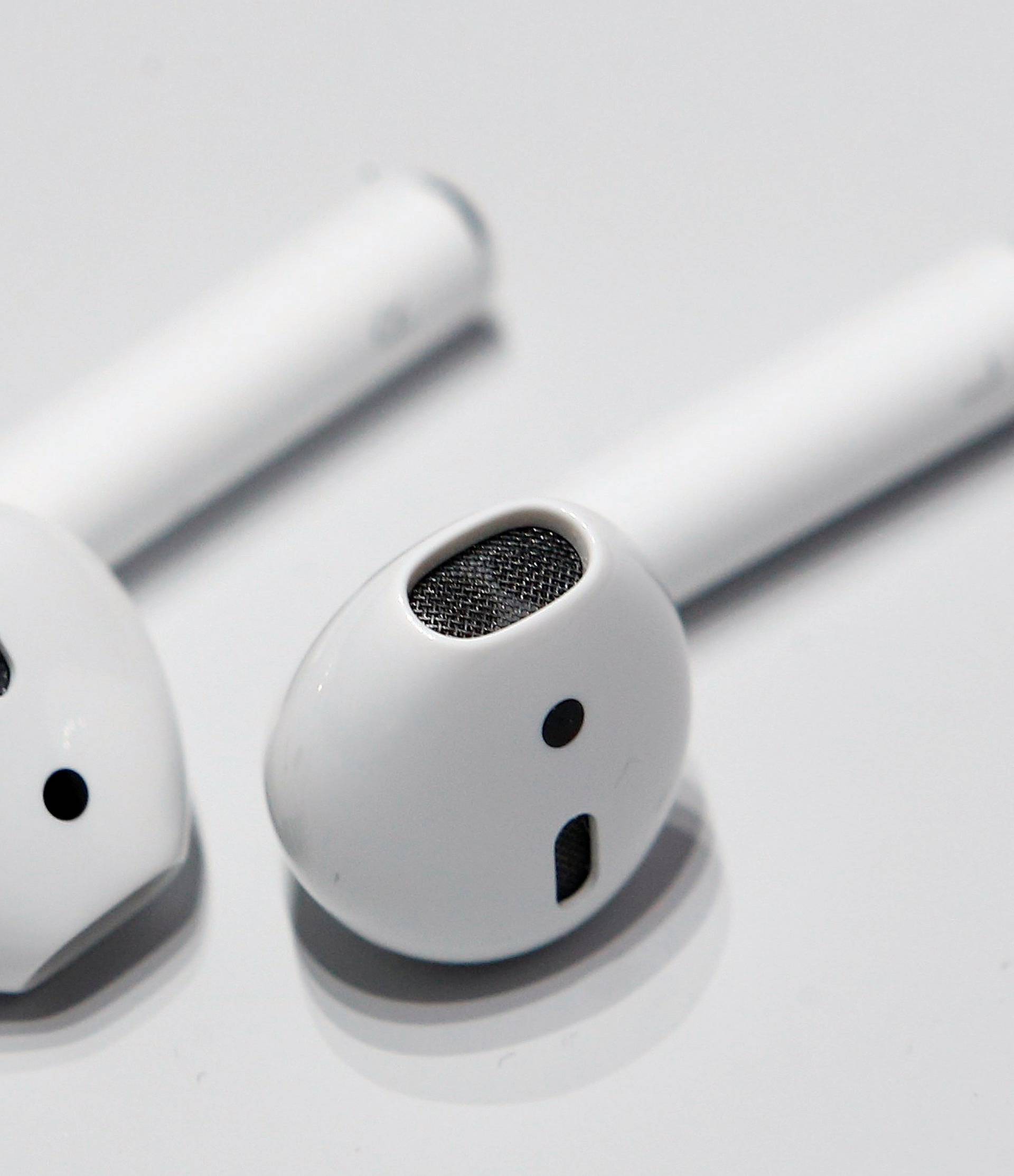 Apple AirPods are displayed during a media event in San Francisco