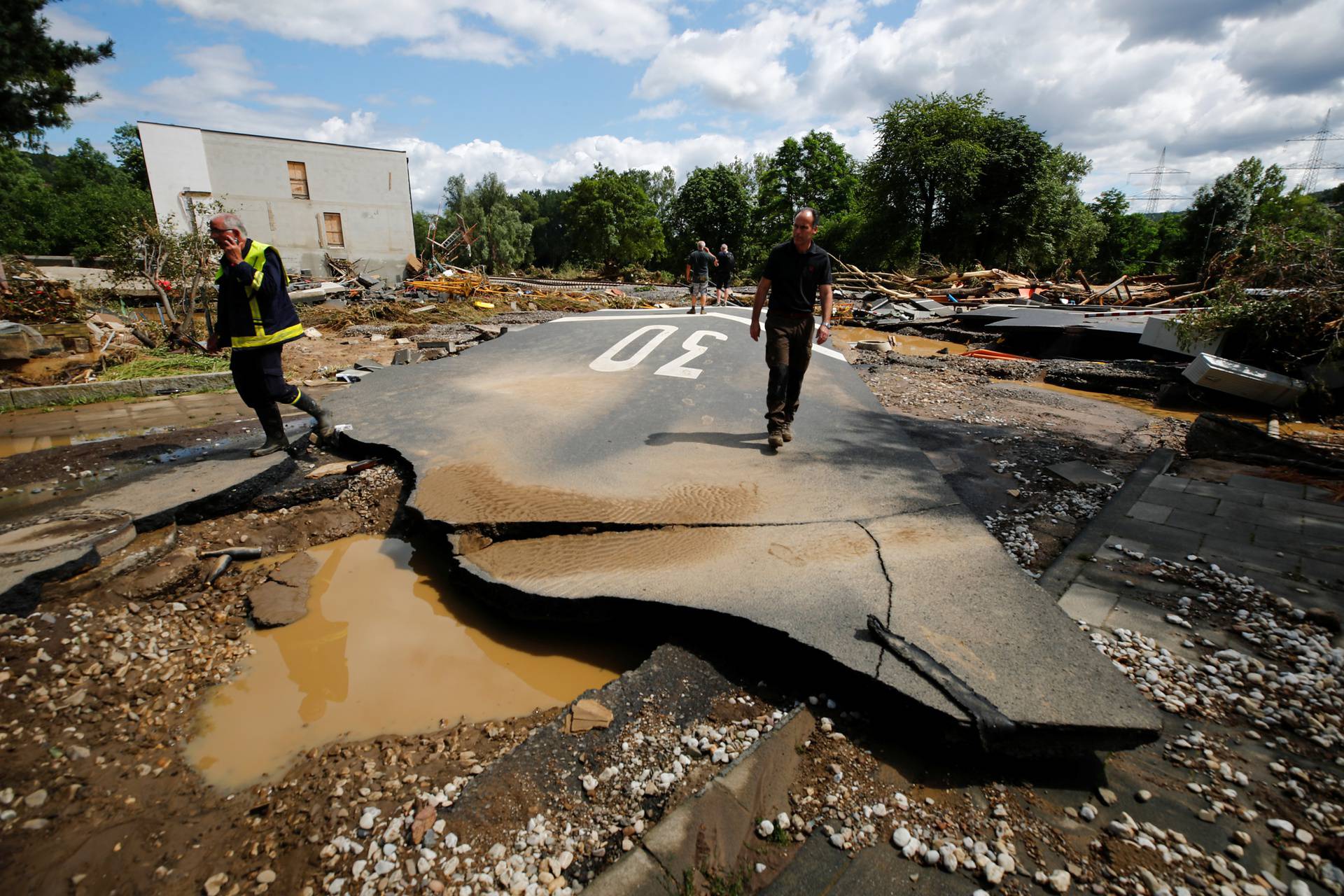 A destroyed road is seen on a flood-affected area in Bad Neuenahr-Ahrweiler