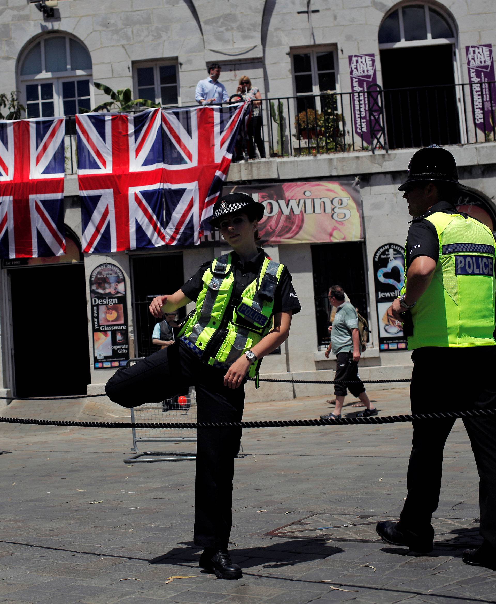 Gibraltarian police officers patrol Casemates square before the cancellation of the "Stronger In" campaign event before the death of lawmaker Jo Cox, in the British overseas territory Gibraltar, historically claimed by Spain