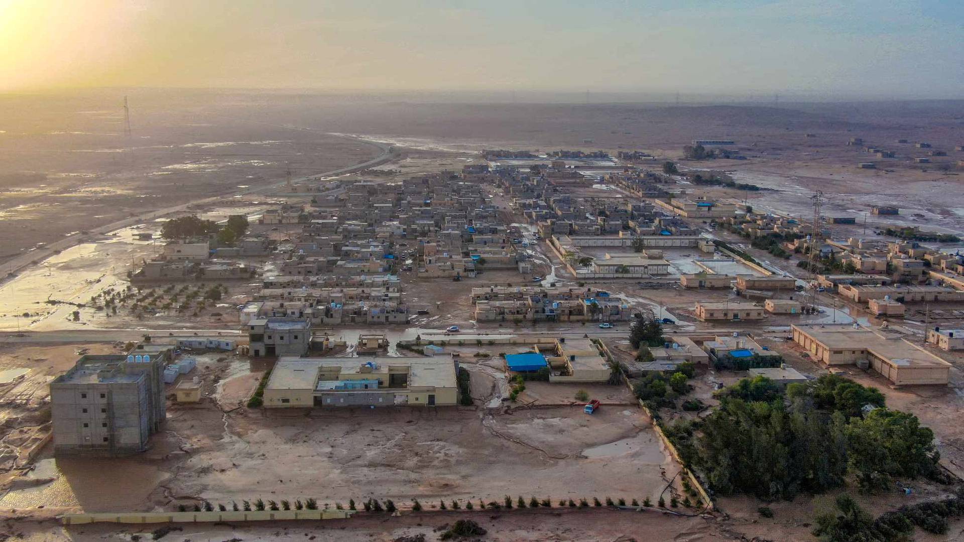 General view of flood water covering the area as a powerful storm and heavy rainfall hit Al-Mukhaili