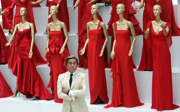 FILE PHOTO: Veteran Italian fashion designer Valentino Garavani poses during the opening of his exhibition at the Ara Pacis Museum in Rome