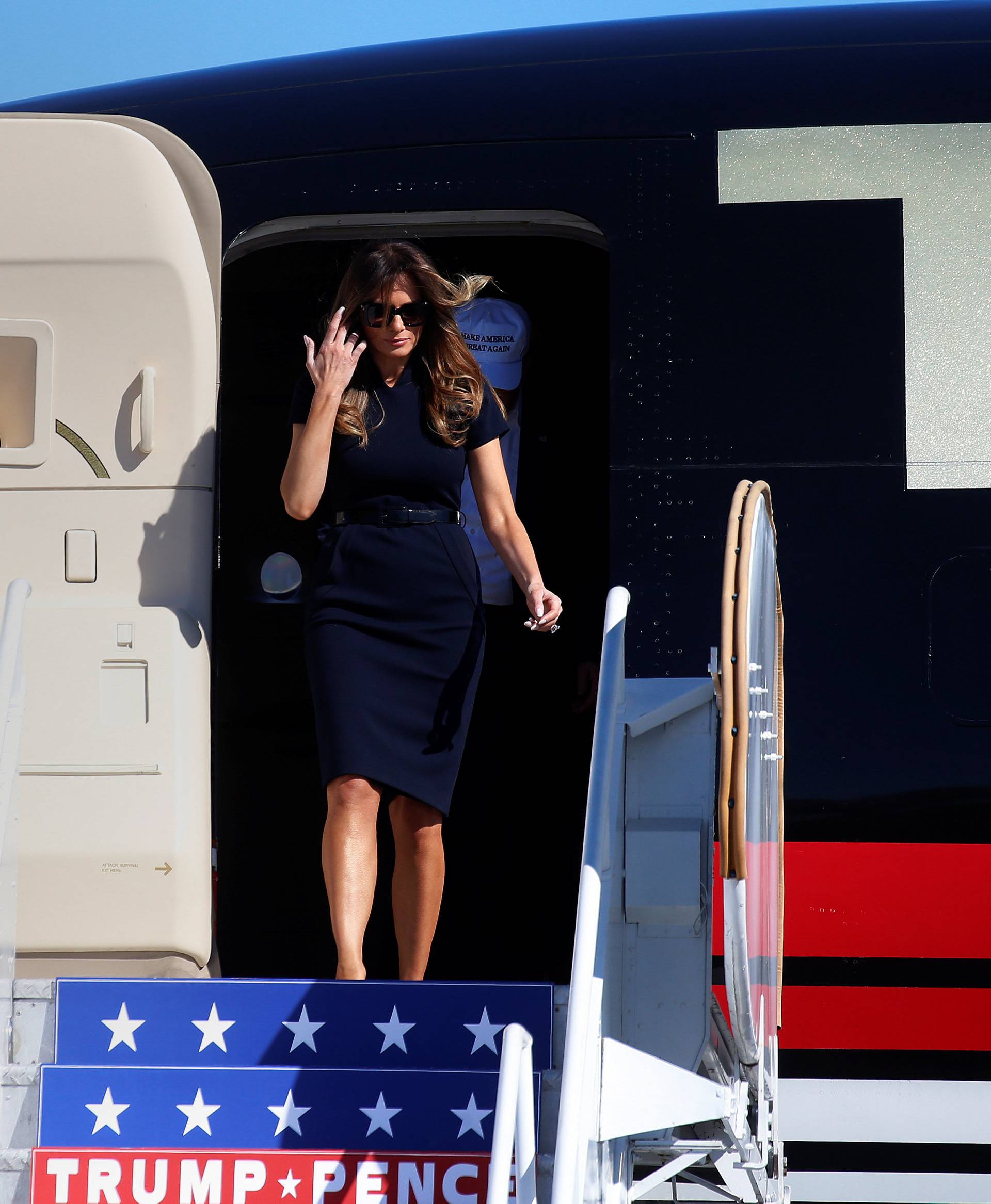 Wife of Republican presidential nominee Donald Trump,  Melania Trump walks off the plane at a campaign rally in Wilmington