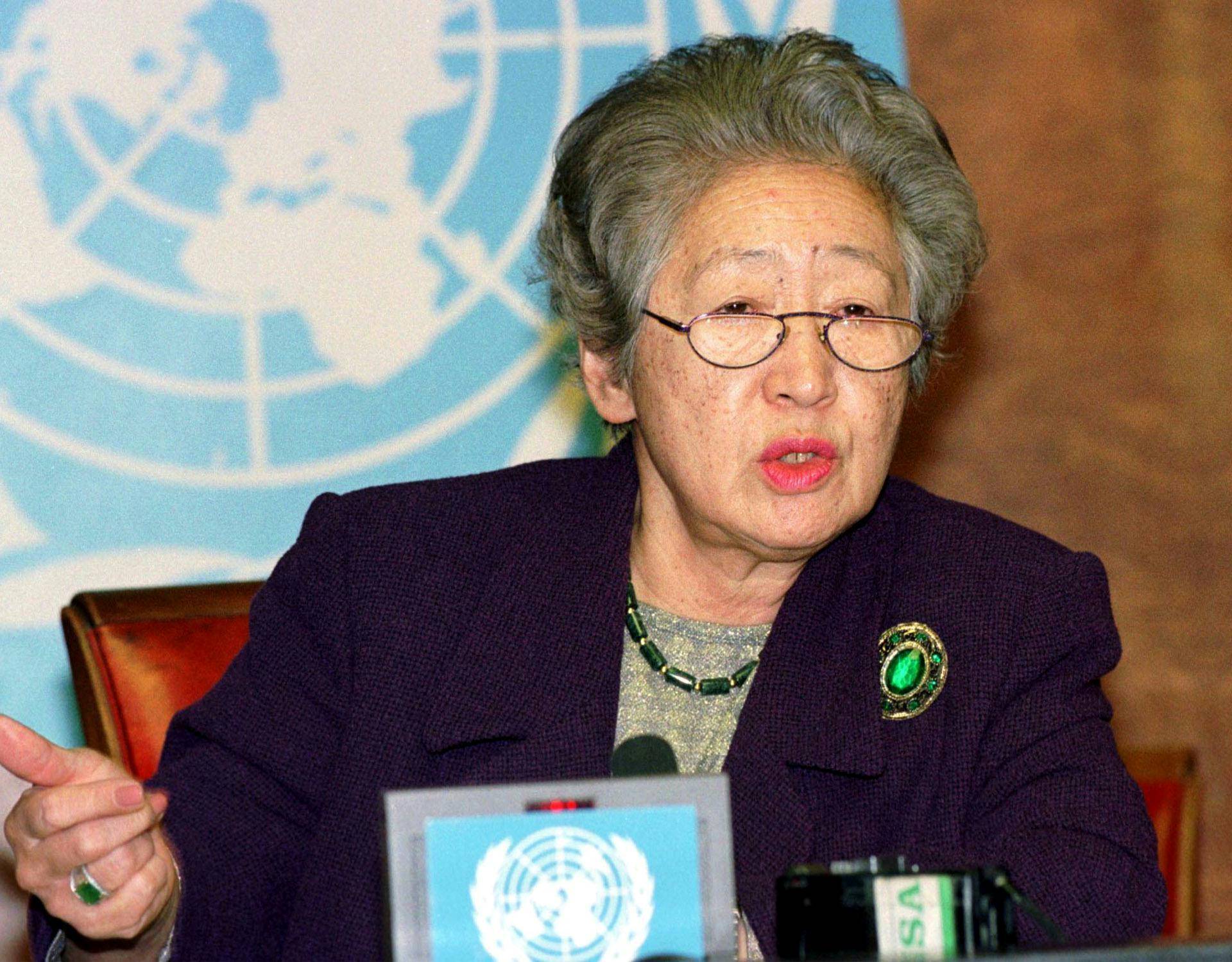 FILE PHOTO:  United Nations High Commissioner for Refugees Sadako Ogata gestures during a news conference in Geneva