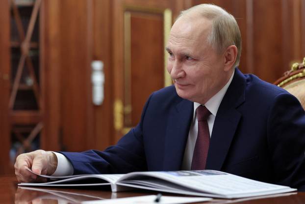 Russian President Vladimir Putin meets with DOM.RF CEO Vitaly Mutko in Moscow