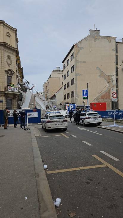 FOTO: U centru grada urušila se skela, prizori su dramatični...