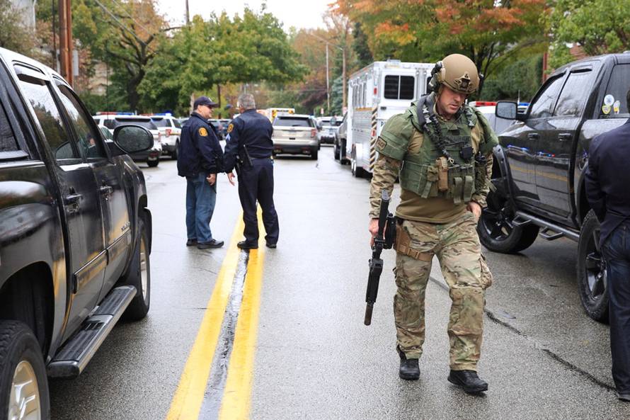 Police officers respond after a gunman opened fire at the Tree of Life synagogue in Pittsburgh Pennsylvania